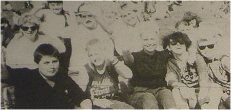 Captions: Isn’t it fun when the sun is shining and the music is flowing? This happy bunch obviously thinks so as they rock to Sunday’s sounds in the crowded Castle Grounds.